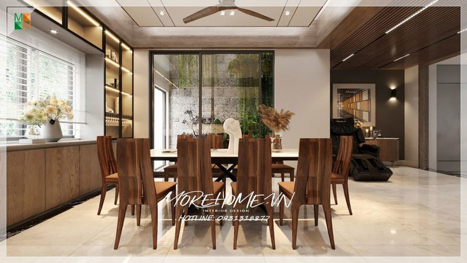 Kệ tủ phòng ăn món đồ nội thất nhận được rất nhiều những lời khen từ phía khách hàng. Bạn có thể tận dụng những ngăn tủ kính phía trên làm nơi trưng bày những món đồ trang trí bắt mắt. Những ngăn tủ phía dưới làm nơi bảo quản những món đồ, vật dụng cần thiết trong không gian bếp ăn.